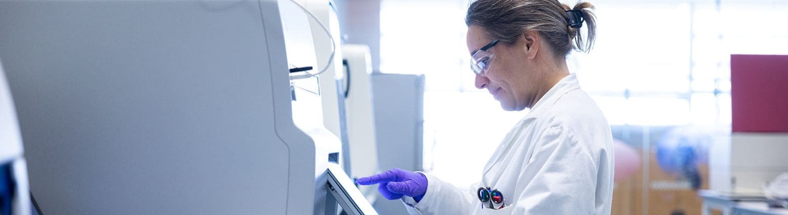 Scientist performing digital PCR analysis to support orthotopic models in oncology research, enabling precise quantification of tumor-related biomarkers